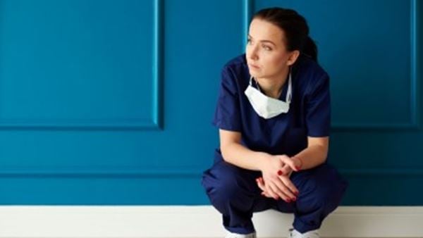 Female surgeon in corridor