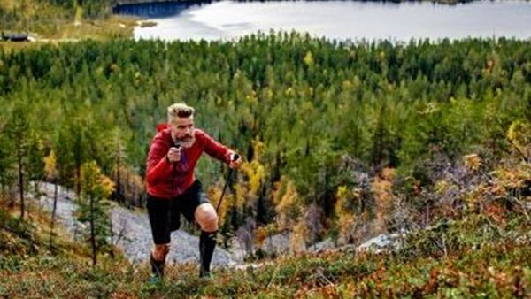 Man running up mountain